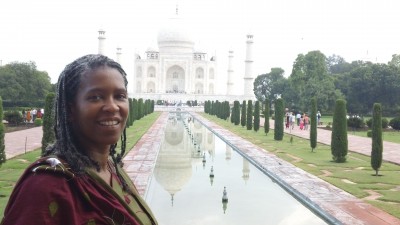 Ms. Foss in front of the water works leading to the Taj Mahal