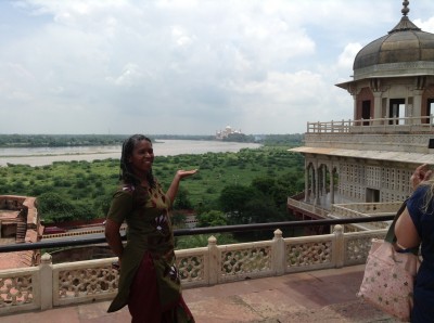 good red fort showing taj